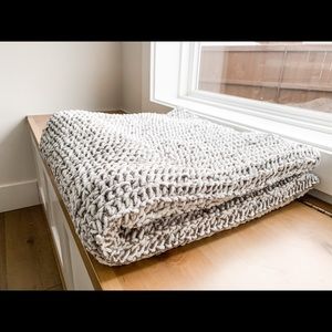 Gray and white hand knit throw